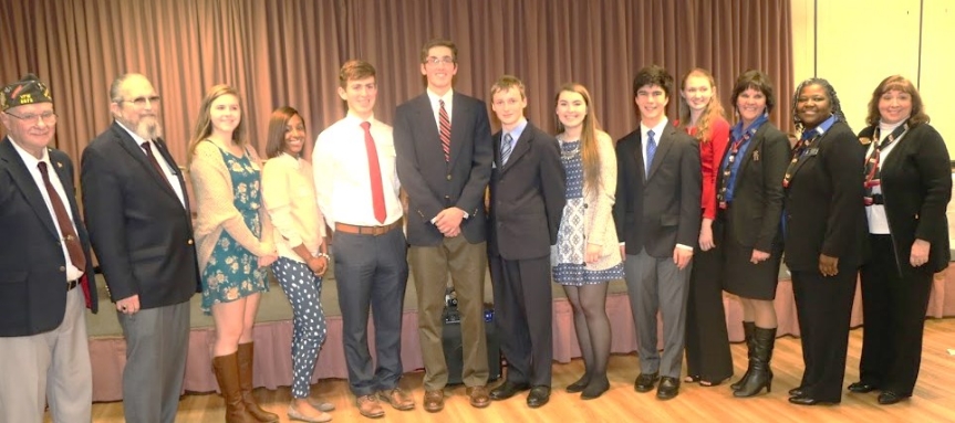 Shown are the VFW Voice of Democracy Chairman, State Commander, all the contestants, State Auxiliary President, State Auxiliary Scholarship Chairman and National Auxiliary Junior Vice President.  